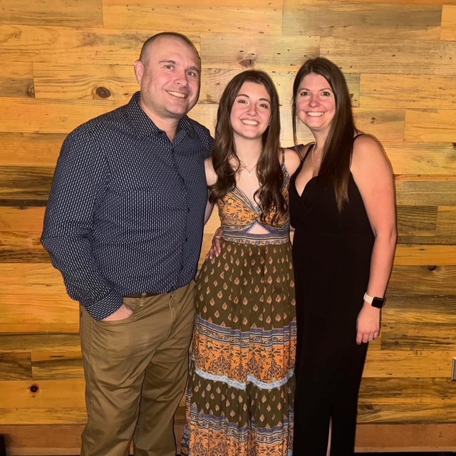 Michael Sixel with his wife and daughter