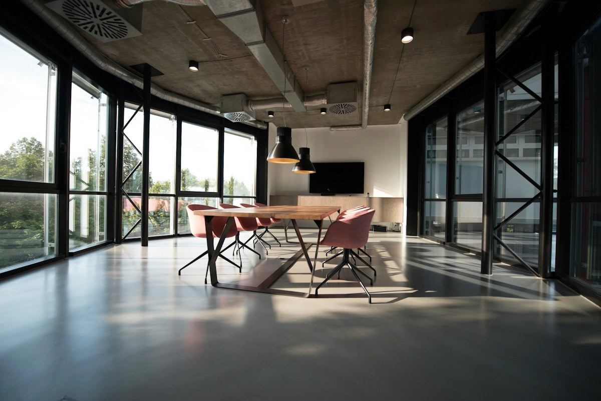A quiet meeting space with a table and chairs